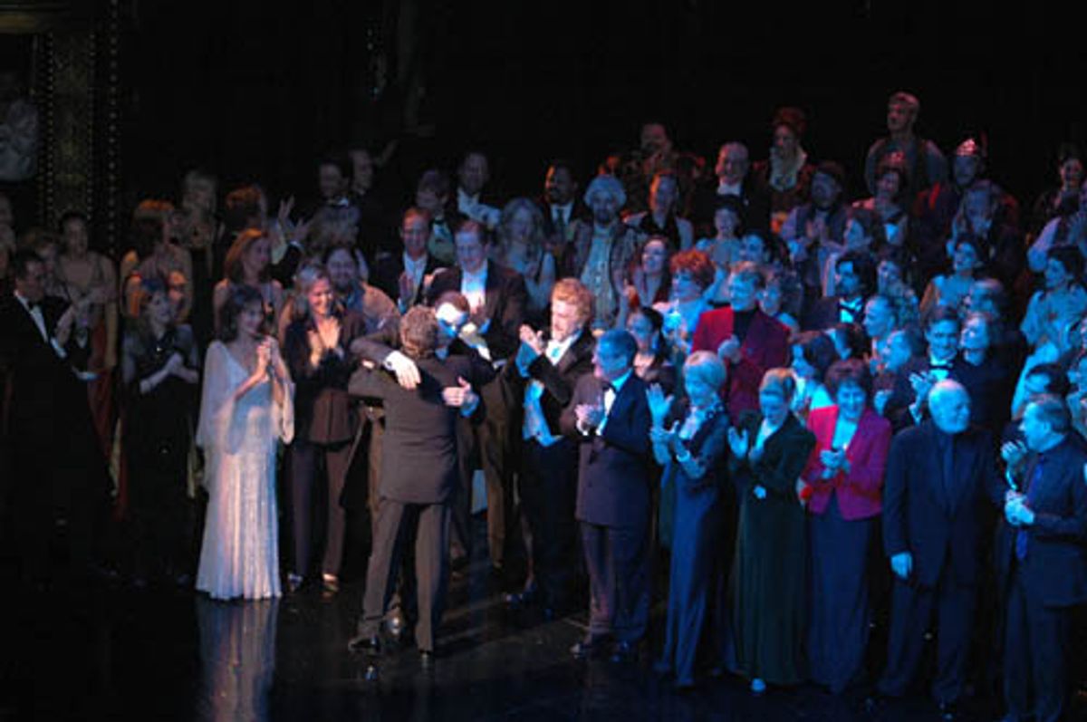 Crawford's first act on stage? Congratulating and hugging current Phantom Howard McGillin at 